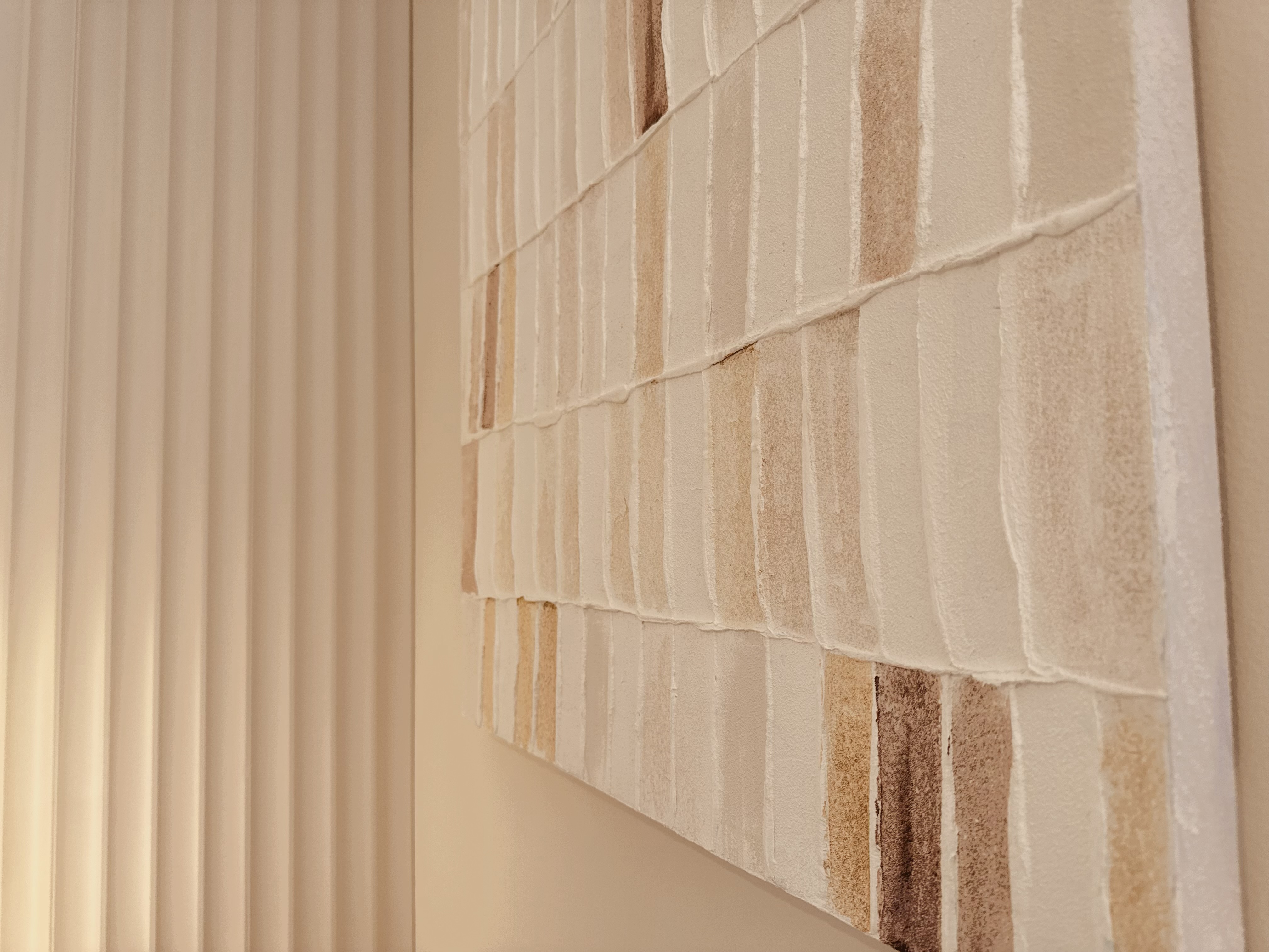 Handcrafted artbrick wall detail at Sabi House