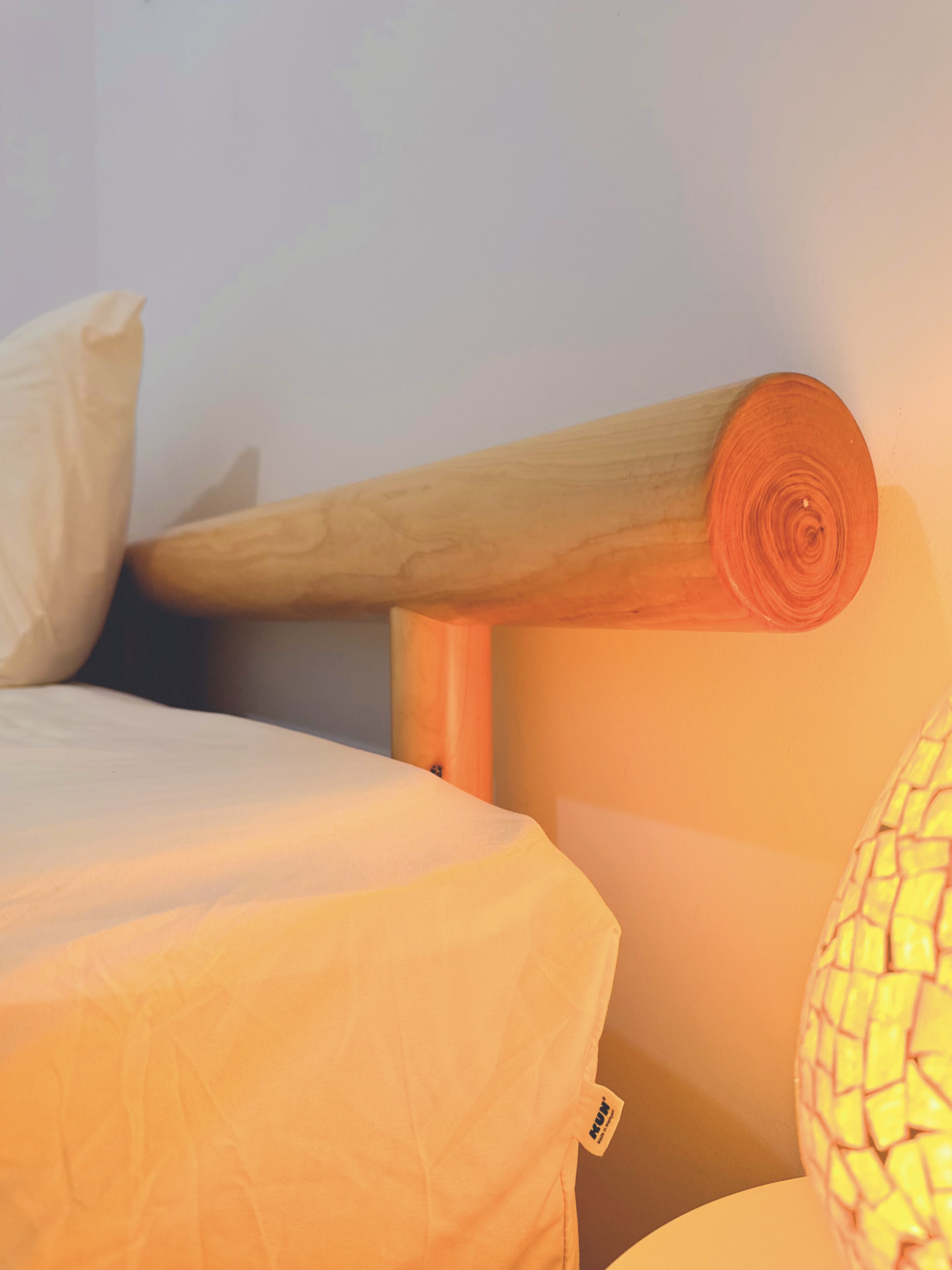 Bedroom 2 with queen bed frame at Sabi House